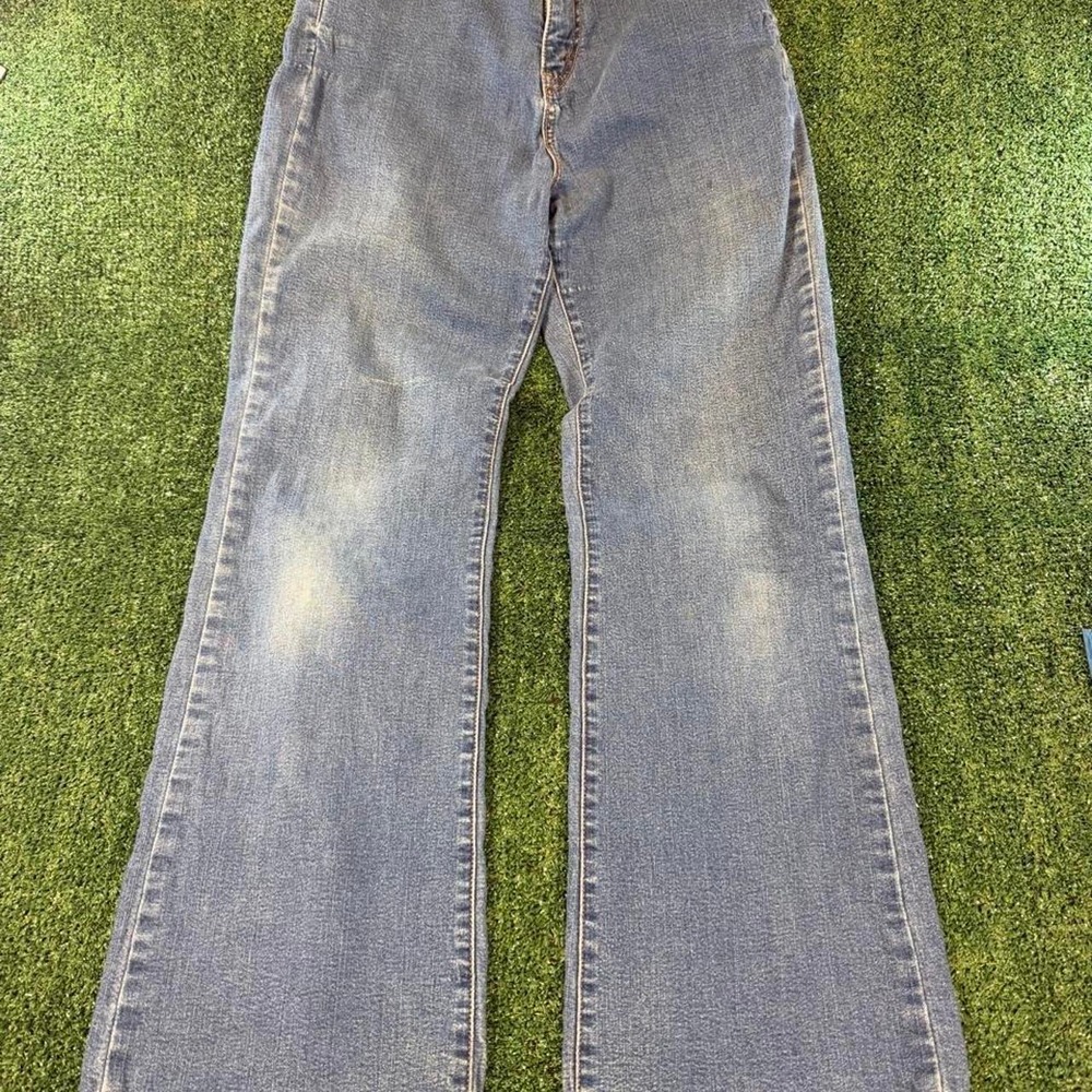 Vintage Levi's 512 Perfectly Slimming bootcut flare jeans in a medium wash with